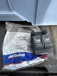 Nos Gm 25725880 Lh Power Window Switch Assembly. Fixed Price $59.00.