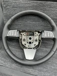 New Oem 2009-2014 Cadillac Cts Black Leather Steering Wheel. Fixed Price $260.09.