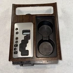 2008-2015 Nissan Titan Center Shifter Trim Bezel Gray W/ Cup Holder. Fixed Price $44.90.