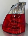 63217164473 Genuine Bmw E53 X5 Tail Light Assembly - New Damaged 3.0I 4.4I 4.8IS. Fixed Price $150.00.