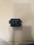 01-04 Dodge Dakota Headlamp Knob / Cargo Dome Wheel (56045532AD) (1701). Fixed Price $29.99.