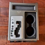 2008-2015 Nissan Titan Center Shifter Trim Bezel Gray + Cup Holder. Fixed Price $44.99.