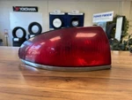 1995 Mercury Mystique Left Tail Light Assembly # F46X-13A659-AA. Fixed Price $70.00.