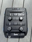 2009-2014 Ford F-150 Climate Control Radio Cd Stereo Faceplate With Bezel & Aux. Fixed Price $70.00.